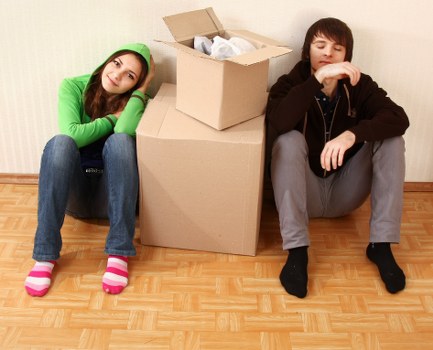 Packing team organising belongings for a move in Canning Town