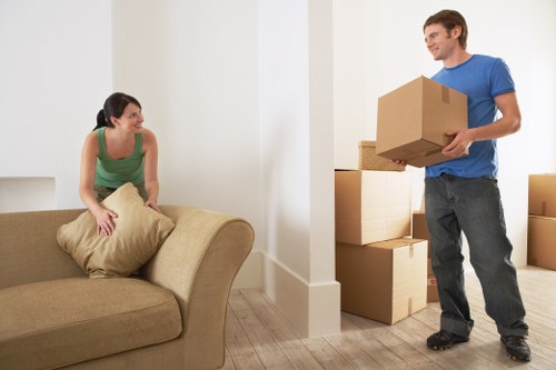 Professional removal team handling furniture during house removals in Canningtown